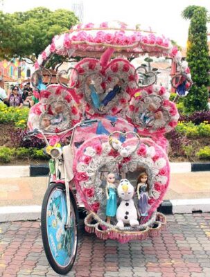 Il trishaw, taxi-bicicletta malese