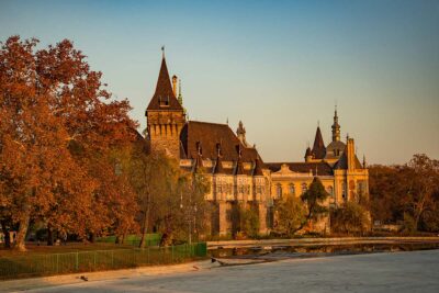 foliage Budapest 2018:,Vajdahunyad,Castle,Reflection,On,Városliget,Lake,In